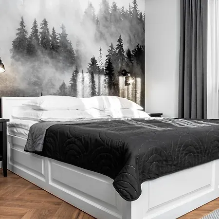 شقة Pod Kominkiem